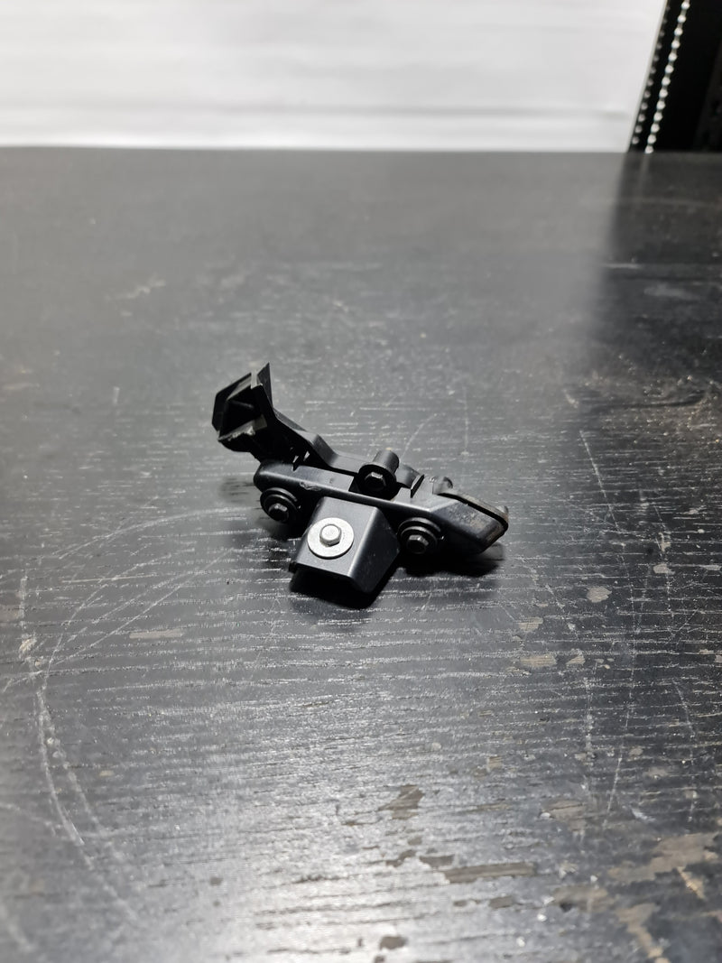 BMW M3 M4 2021-2024 front right bumper lower mount bracket guide by MPerformance.parts, showing the metal bracket and mounting points.