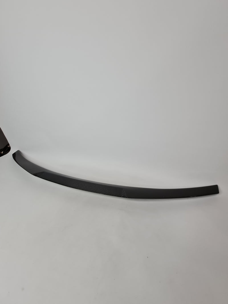 M4 F82 carbon spoiler by MPerformance.parts showing sleek, aerodynamic design for BMW M4 F82 coupe.