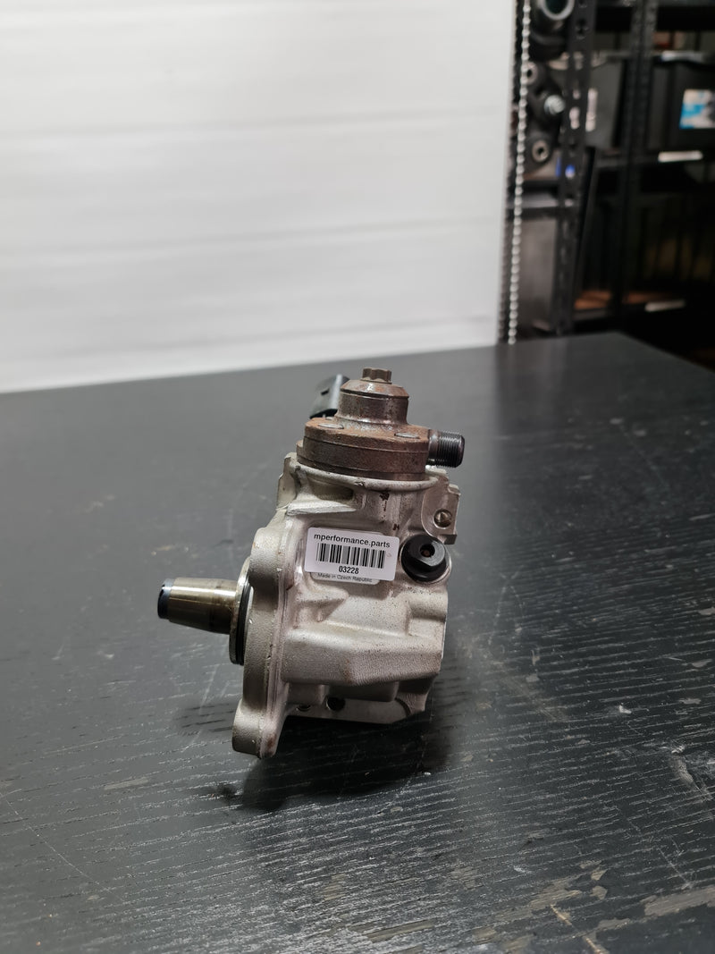 Bosch High-Pressure Fuel Pump 7823463 CP4 for BMW F15 X5 N57 engine, shown in close-up image.