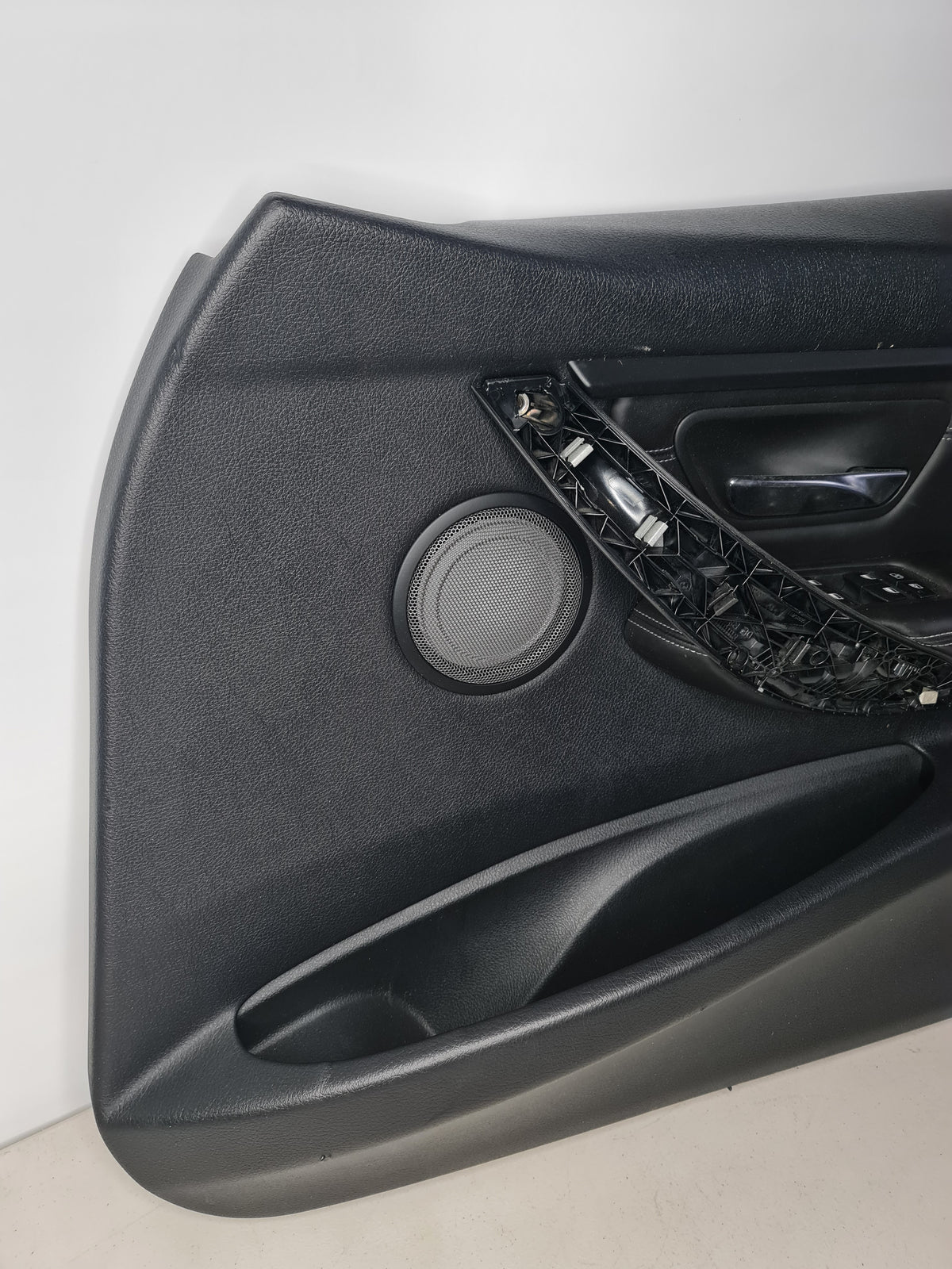 BMW F80 M3 driver door card with rear sunshade button and window switches, MPerformance.parts replacement interior component.