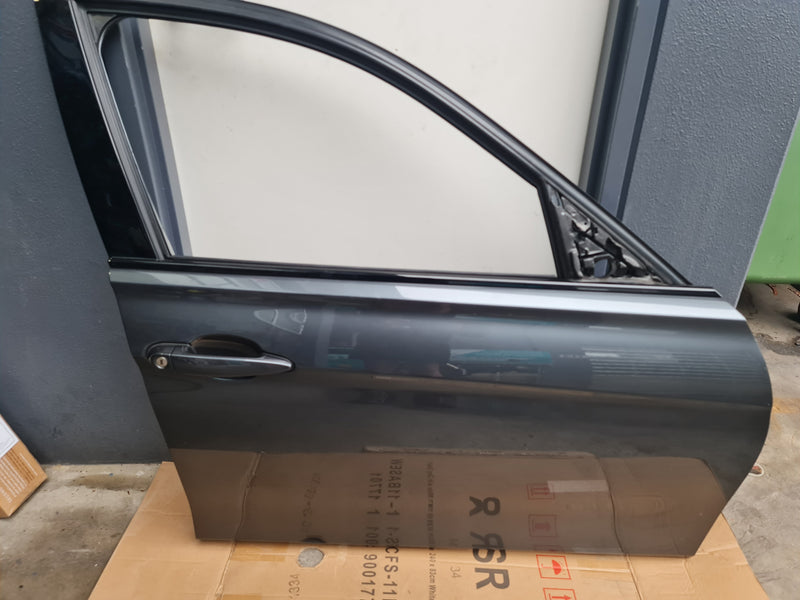 BMW F80 LCI M3 driver door in grey, compatible with 3 Series, from MPerformance.parts, showing the exterior side and handle.