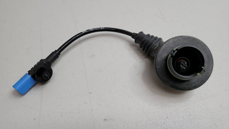 BMW M3 G80 EDC suspension adapter cable by MPerformance.parts, showing the black cable with connector ends for suspension system upgrade.
