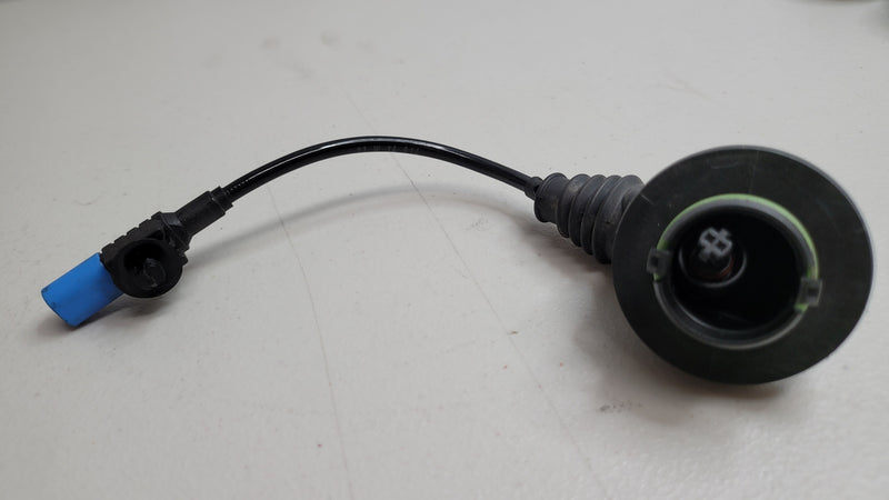 BMW M3 G80 2023 EDC suspension adapter cable by MPerformance.parts, showing the black cable with connectors for vehicle suspension system.