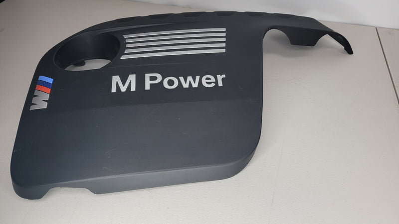 BMW M Power M3 M4 F80 F82 F83 engine cover protection panel by MPerformance.parts, showcasing the sleek black engine cover design.