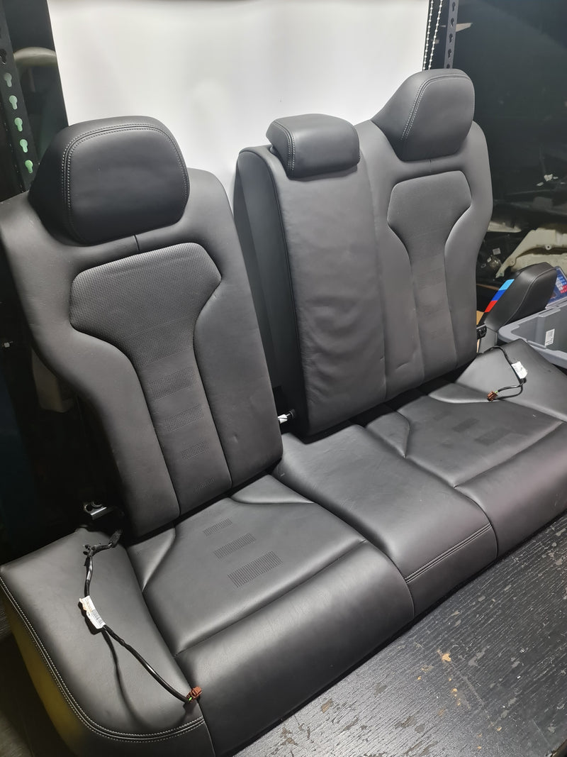 F80 M3 LCI heated rear seats from MPerformance.parts, showing black leather upholstery and heating elements.