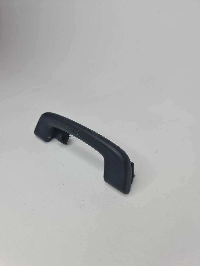 Black F80 Roof Grab Handle Arm Holder by MPerformance.parts, shown mounted inside a vehicle for secure passenger support.
