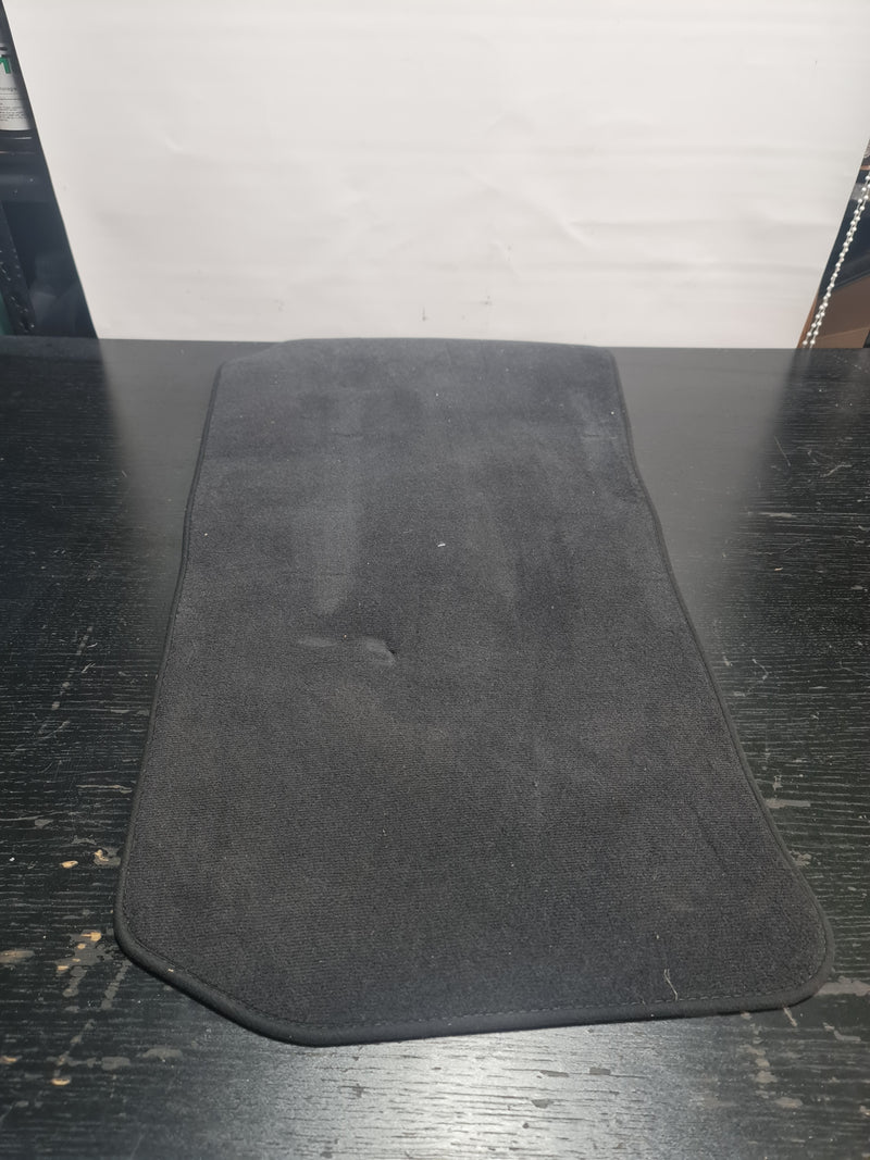 Genuine BMW M3 G80 velour carpet floor mats in charcoal, branded MPerformance.parts, showing textured interior floor coverage.