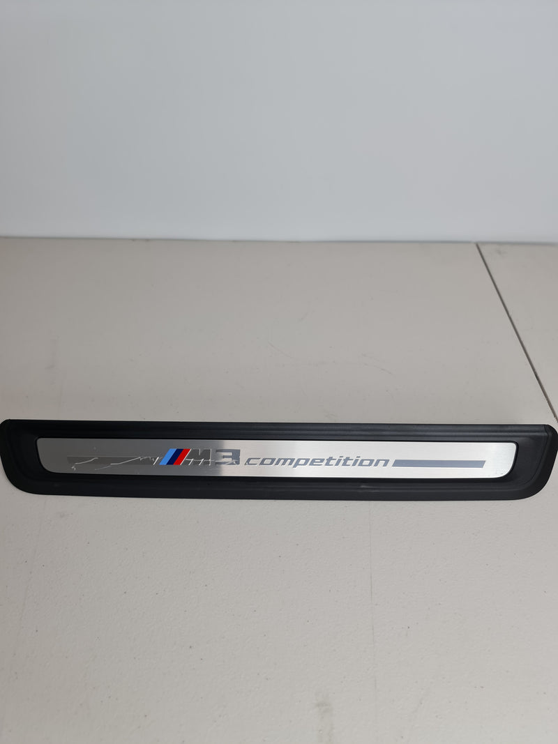 BMW G80 M3 Competition OEM front door sill kick plate by MPerformance.parts, durable aluminum with M3 branding.
