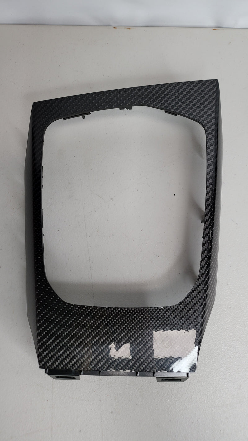 BMW G80 M3 Carbon Center Console Trim by MPerformance.parts, showing sleek black carbon fiber finish on the interior console.