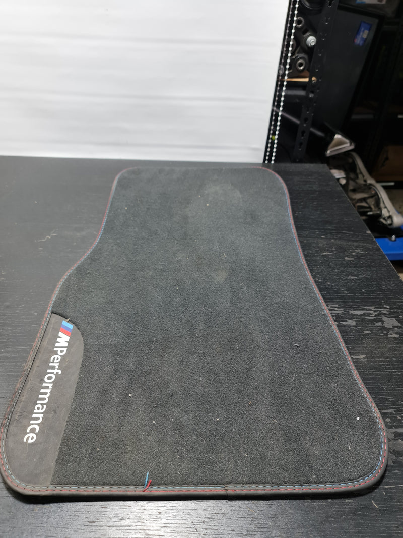 G82 M4 M Performance passenger floor mat by MPerformance.parts, black rubber mat with logo for BMW G82 M4 interior.