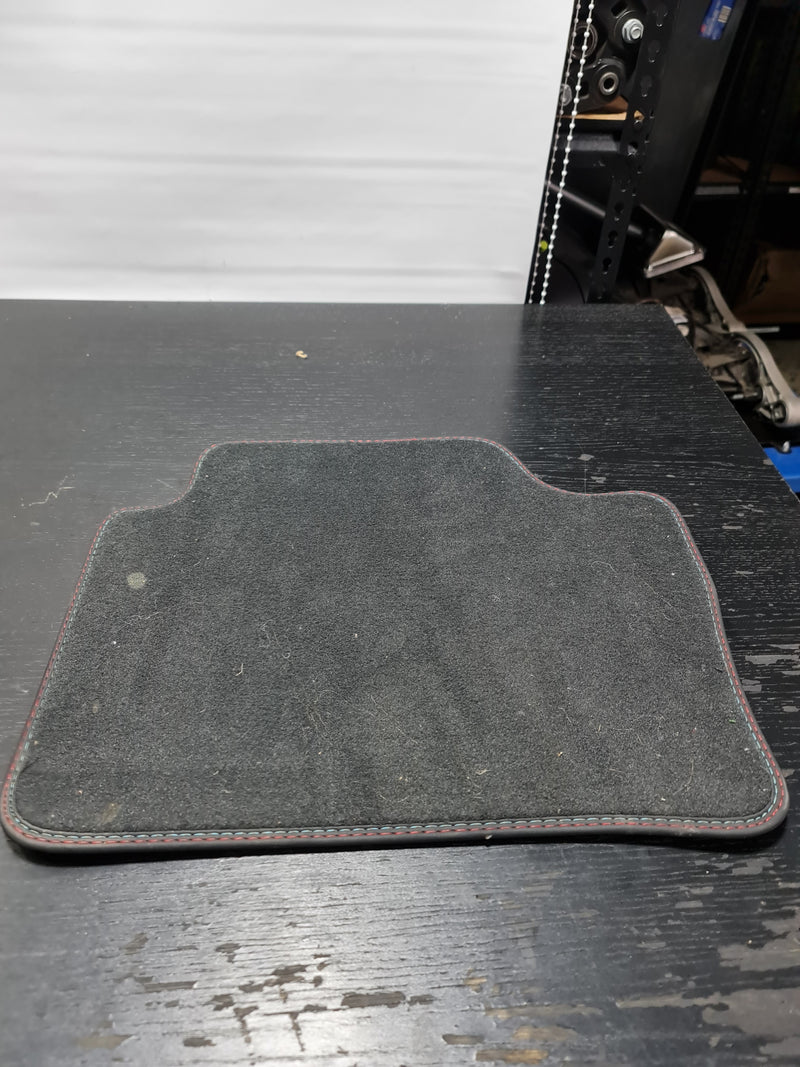 G82 M4 rear floor mat by MPerformance.parts, black rubber mat with textured surface for vehicle protection and clean interior.