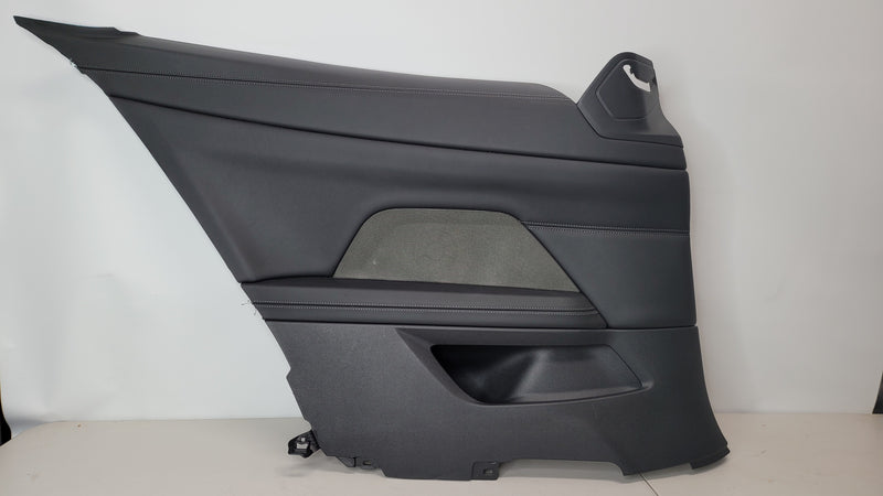 G82 M4 rear passenger side door card by MPerformance.parts with black and carbon fiber accents, showcasing interior trim detail.