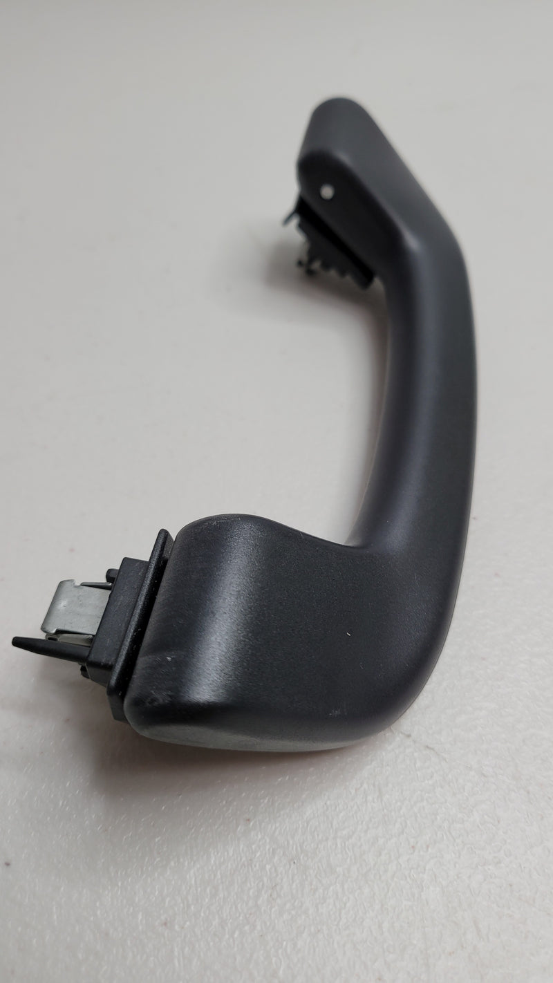 Black F80 roof grab handle arm holder from MPerformance.parts, made of durable PA6GF30 material, designed for easy vehicle access.