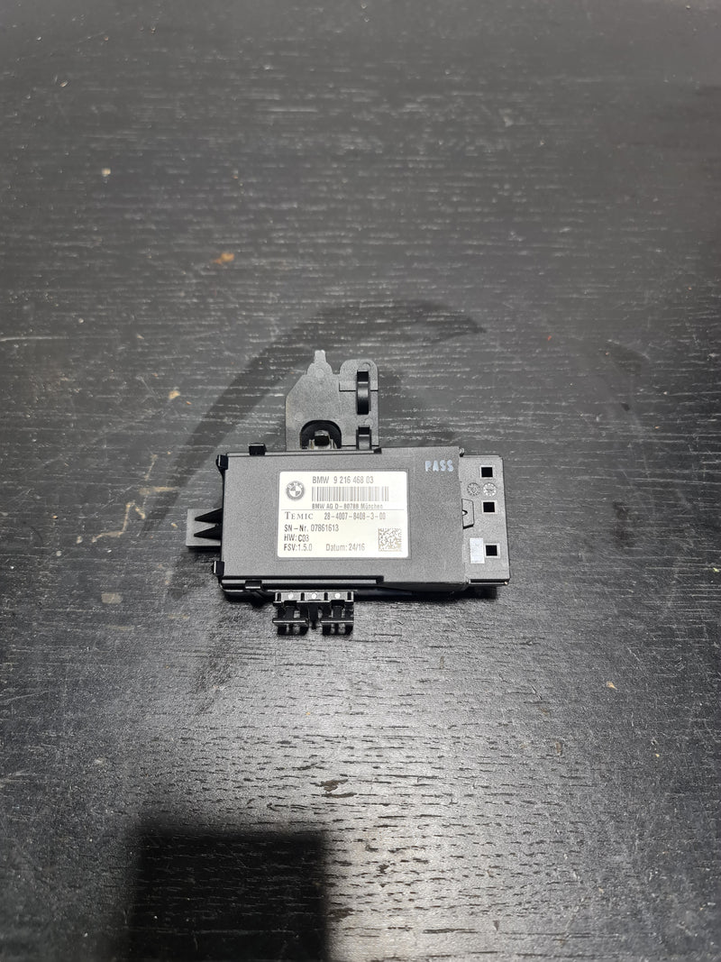 BMW M3 F80 Series OEM heated seat control module by MPerformance.parts, showing the black control unit with connectors.
