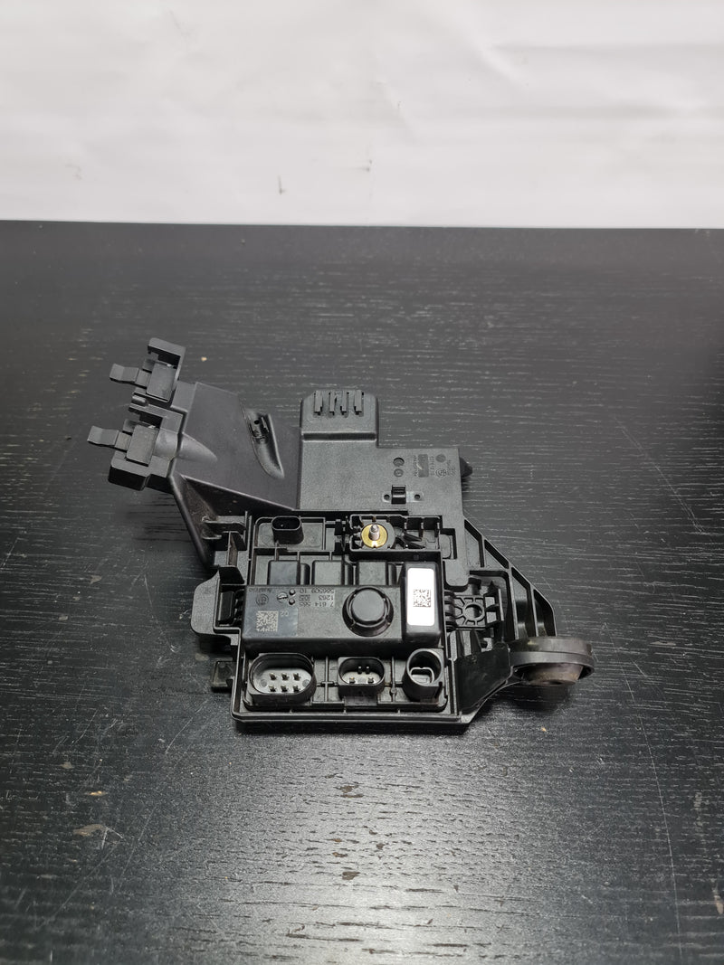 BMW M3 F80 integrated supply module by MPerformance.parts, showing the module with detailed connectors and compact design.