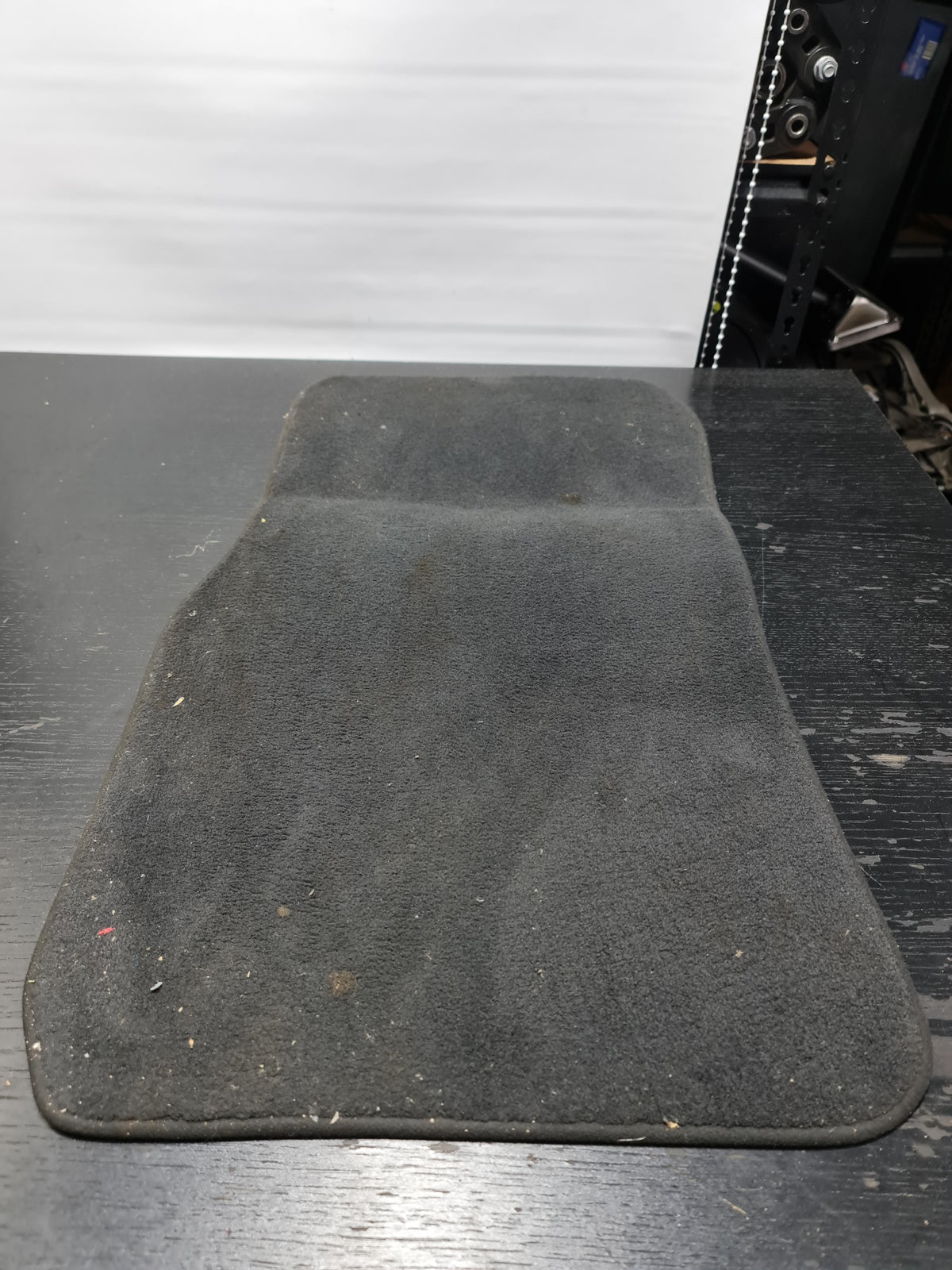 G80 M3 passenger floor mat by MPerformance.parts, black rubber mat with textured surface for vehicle interior protection.