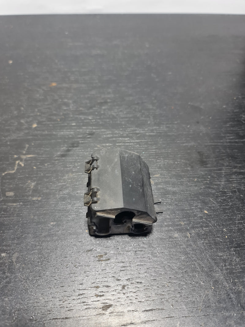BMW M2 plug-in connection bracket by MPerformance.parts, close-up view showing sturdy metal construction and connection points.