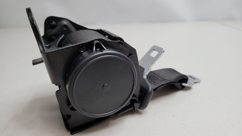 MPerformance.parts rear center seat belt for BMW M3 F80, close-up view of the black seatbelt with mounting hardware.