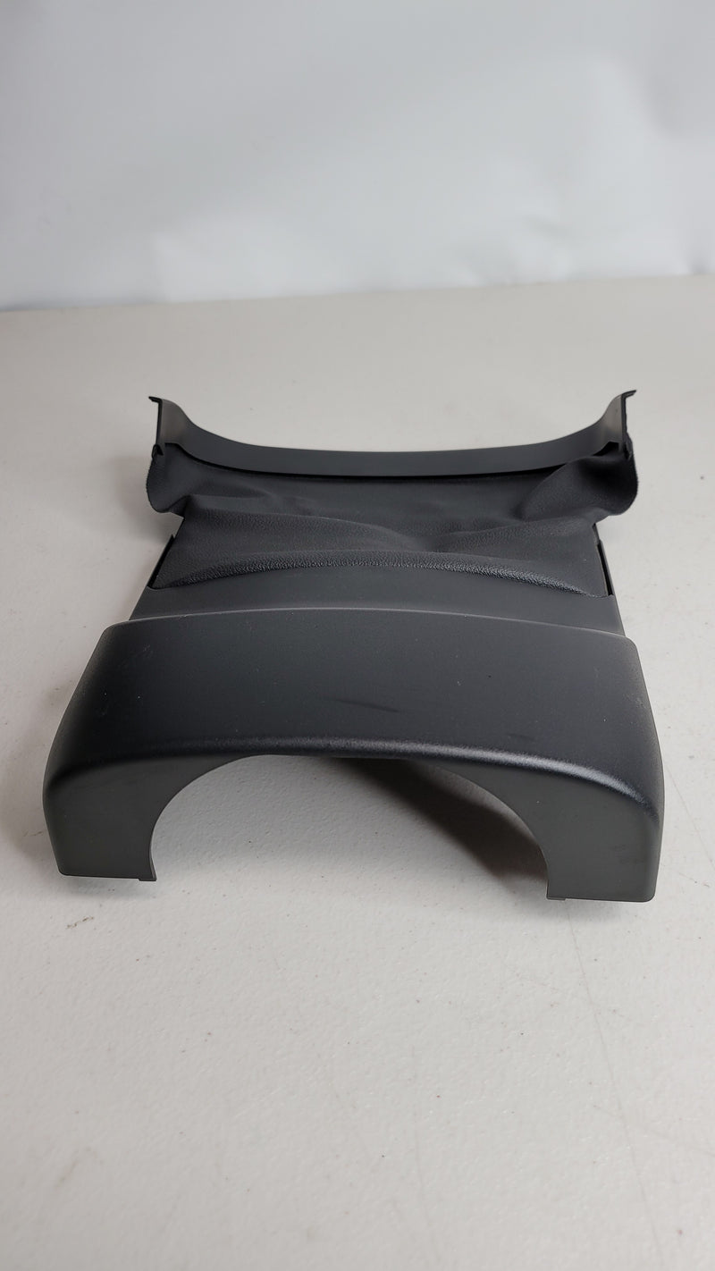 BMW G80 M3 trim steering column bottom part from MPerformance.parts, showing the black plastic component with mounting details.