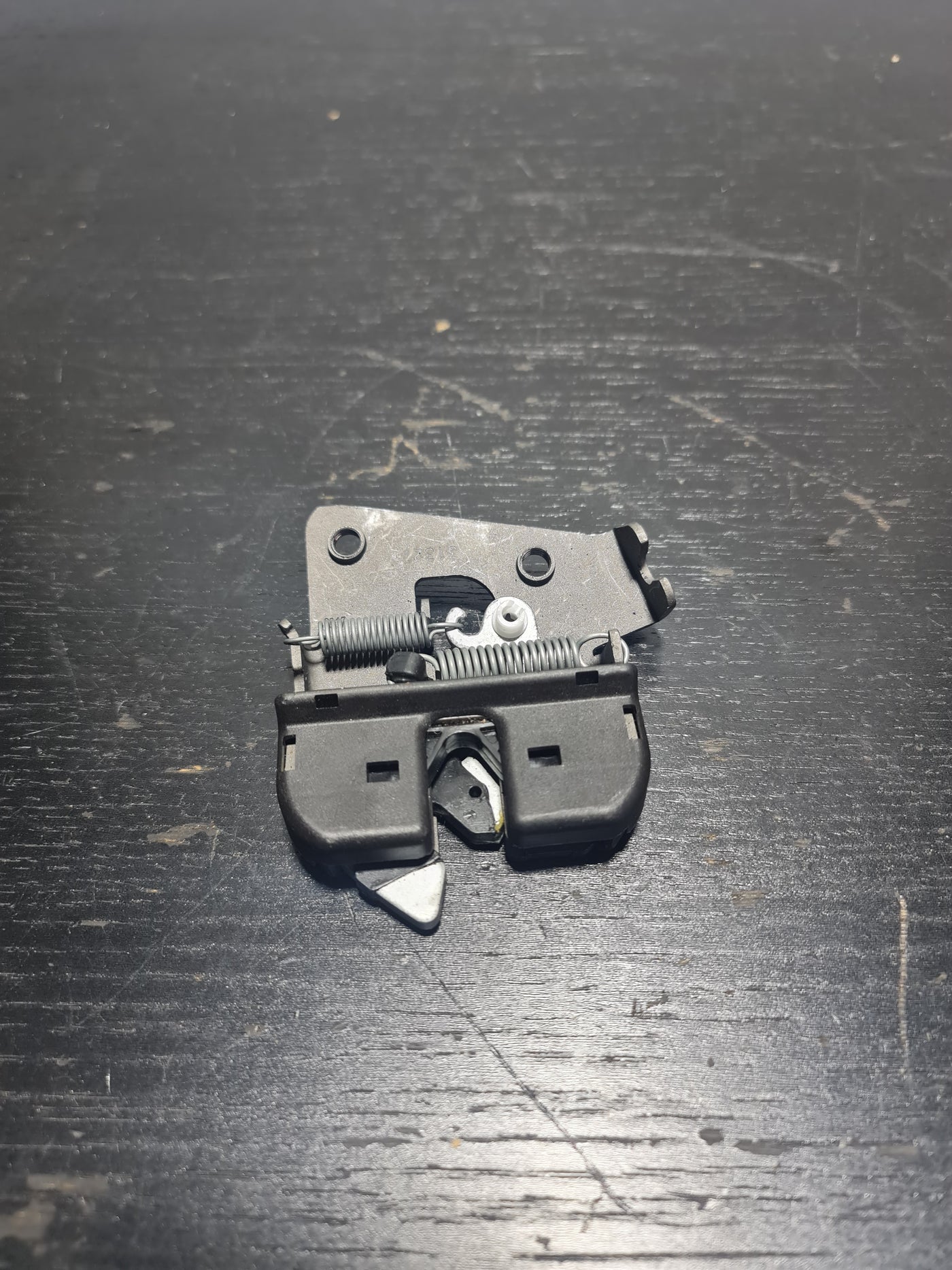 BMW 2004-2020 left lock part from MPerformance.parts, model 52207112863, shown in black with mounting details