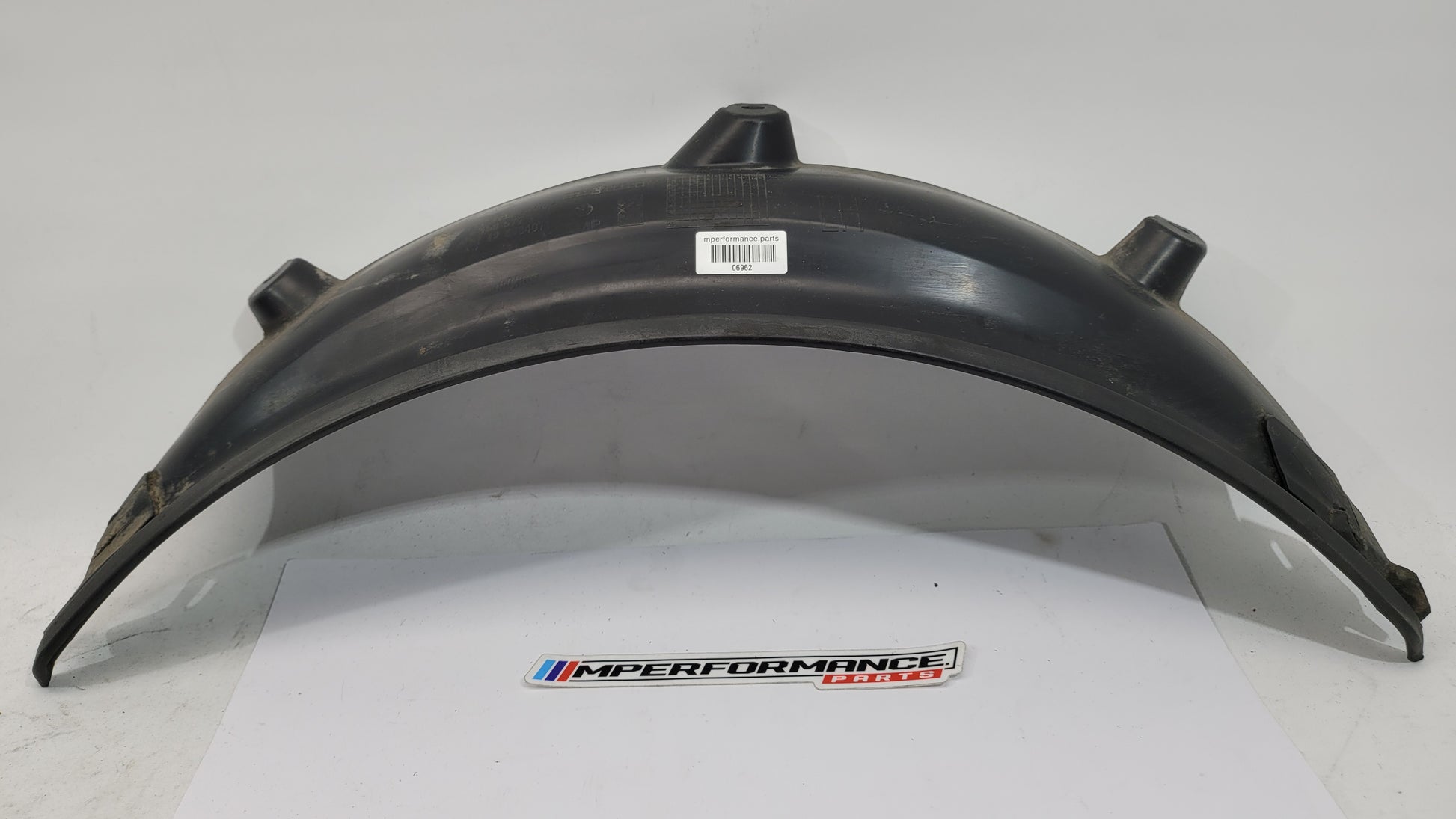 BMW M3 G80 G81 rear left driver side wheel arch trim flaring, MPerformance.parts, close-up view of the wheel arch enhancement.