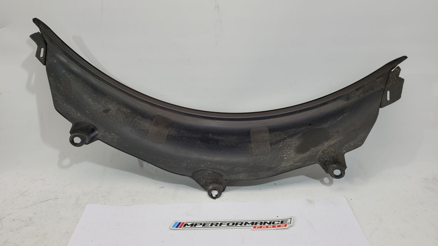 BMW M3 G80 G81 rear left driver side wheel arch trim flaring by MPerformance.parts, showcasing the black plastic wheel arch guard.