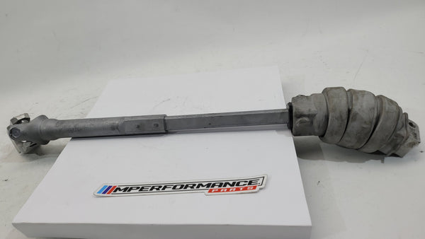 BMW M3 M4 G80 G82 G83 Competition XDrive steering column shaft joint spindle, black metal component with mounting points.