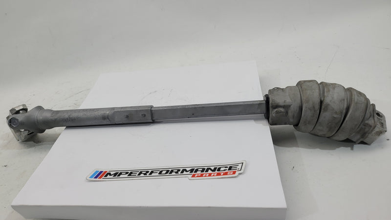 BMW M3 M4 G80 G82 G83 Competition XDrive steering column shaft joint spindle, black metal component with mounting points.