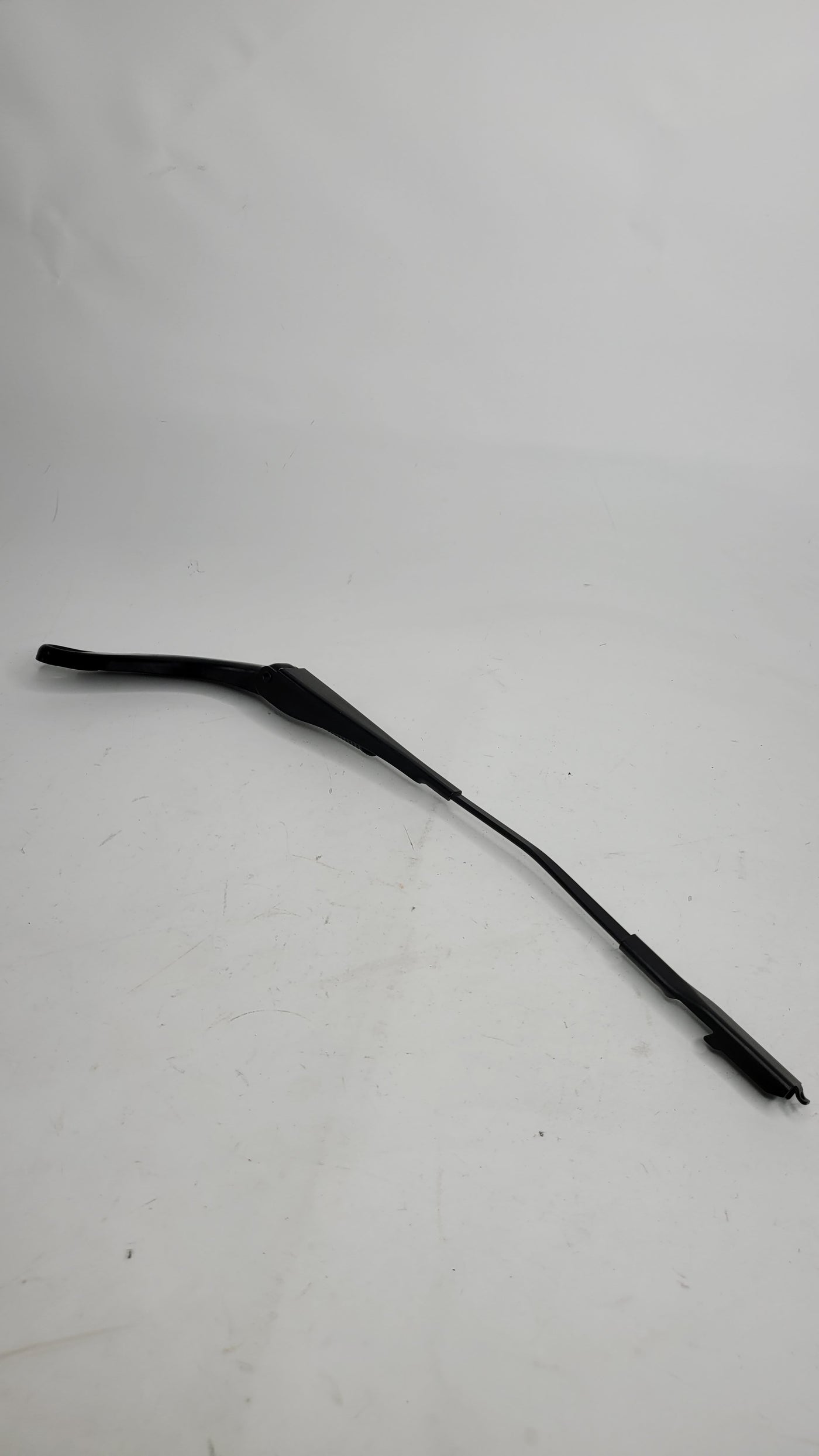 BMW F80 M3 front windscreen wiper arm by MPerformance.parts, showing the metal wiper arm with mounting points and sleek design.