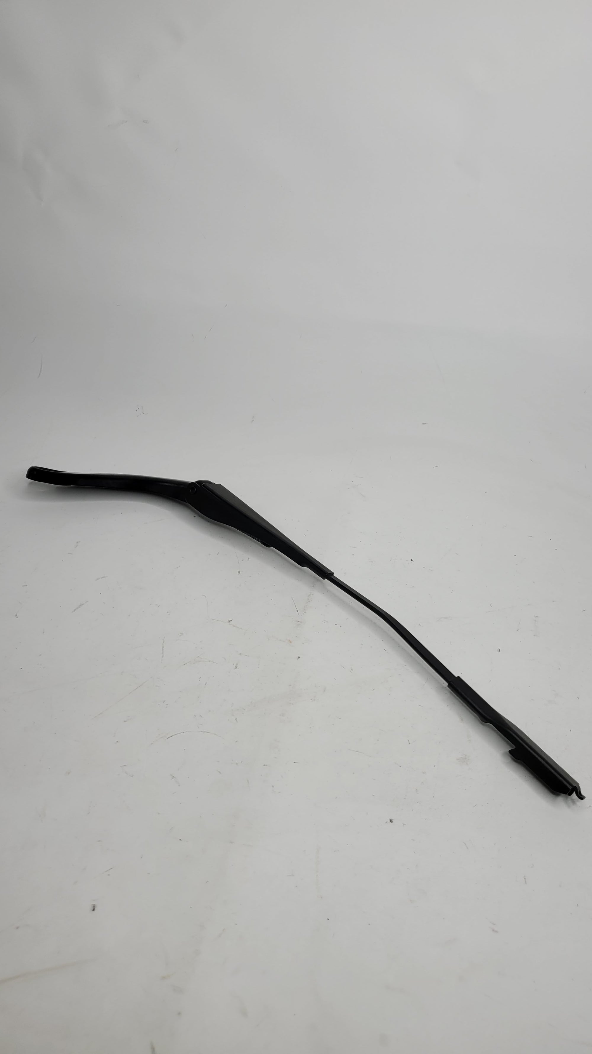 BMW F80 M3 front windscreen wiper arm by MPerformance.parts, showing the metal wiper arm with mounting points and sleek design.