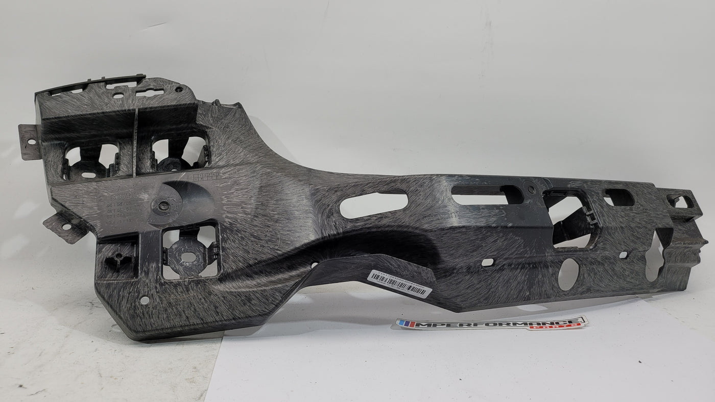 BMW M3 G80 rear left passenger side bumper bracket mount by MPerformance.parts, showing the metal mounting component with bolt holes.