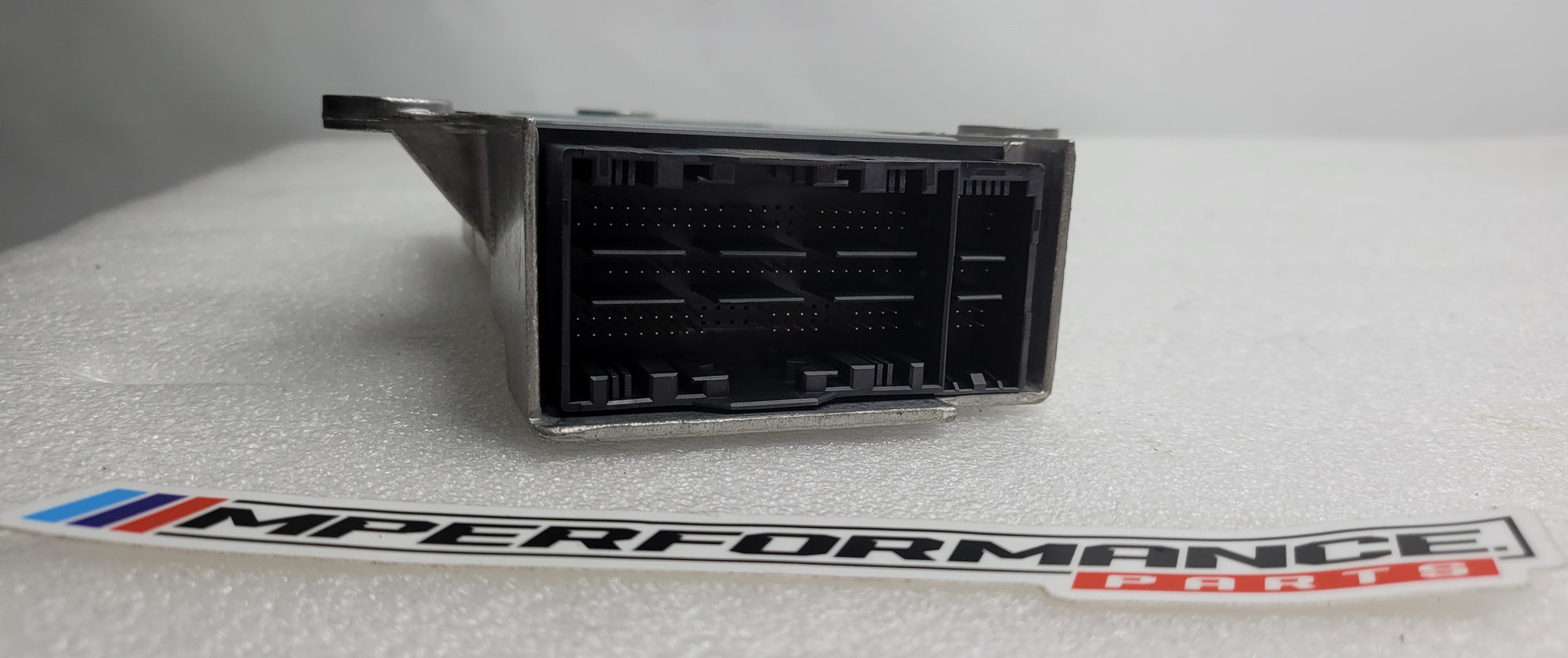 BMW 3 and 4 Series G20 G21 G22 G26 G80 airbag control module ECU SRS 5A1FC42 from MPerformance.parts, showing the unit's circuit board and connectors.
