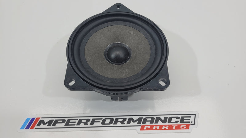 BMW E60 E81 E87 E90 E91 stereo speaker from MPerformance.parts, showcasing mid-range HiFi audio speaker with detailed grille design.