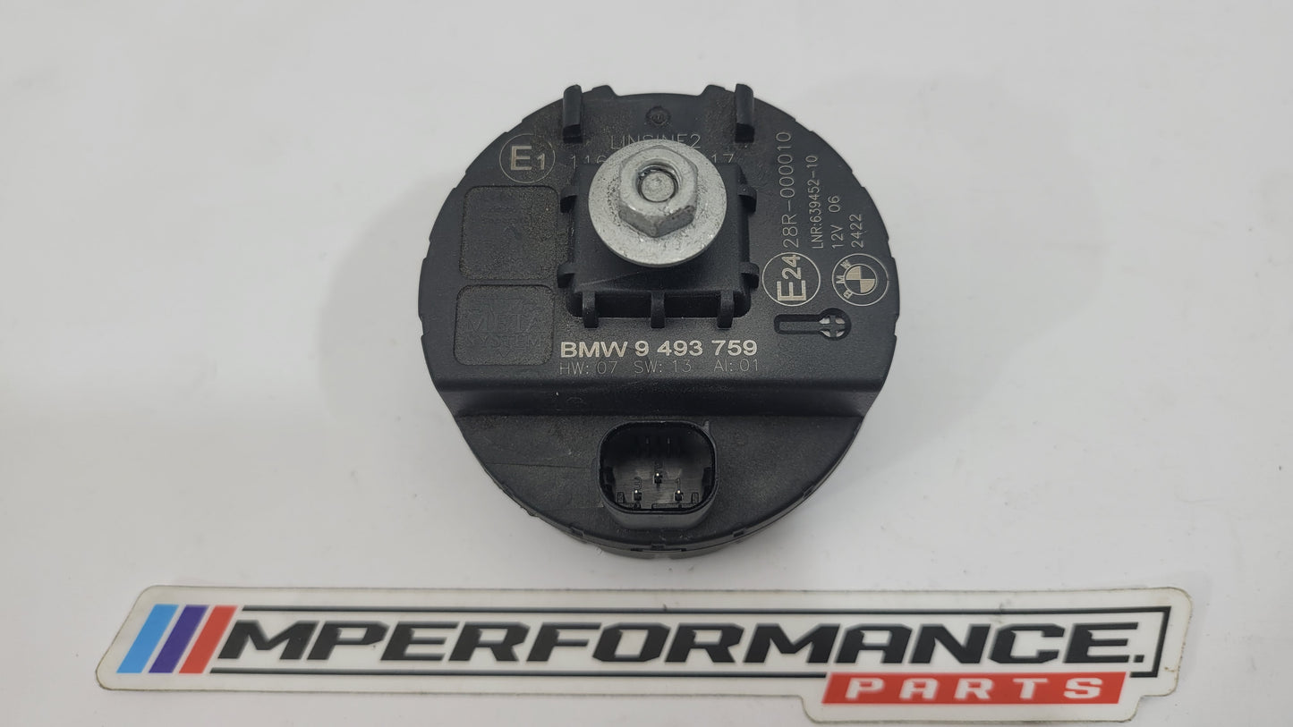 BMW M2 F87 sensor alarm horn and control module unit, featuring electronic components and wiring for vehicle security system.
