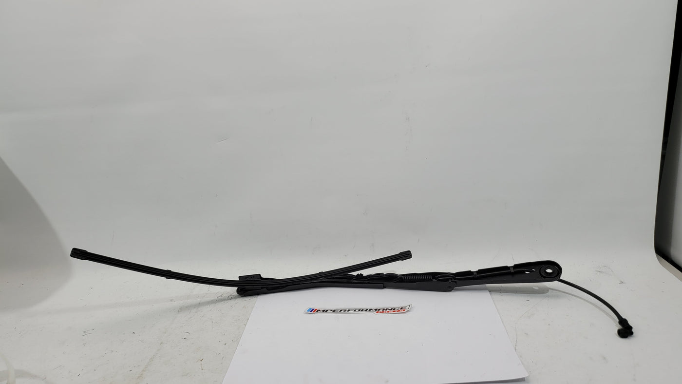 BMW M3 G8x driver side front wiper arm by MPerformance.parts, showing the sleek metal wiper arm with mounting connection.