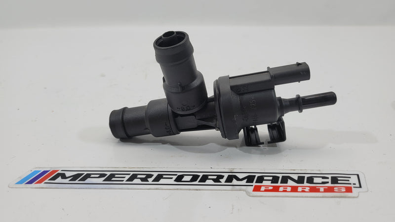 BMW G87 M2 G80 G81 M3 G82 G83 M4 fuel tank breather by MPerformance.parts, showing the black plastic part with fitting details.