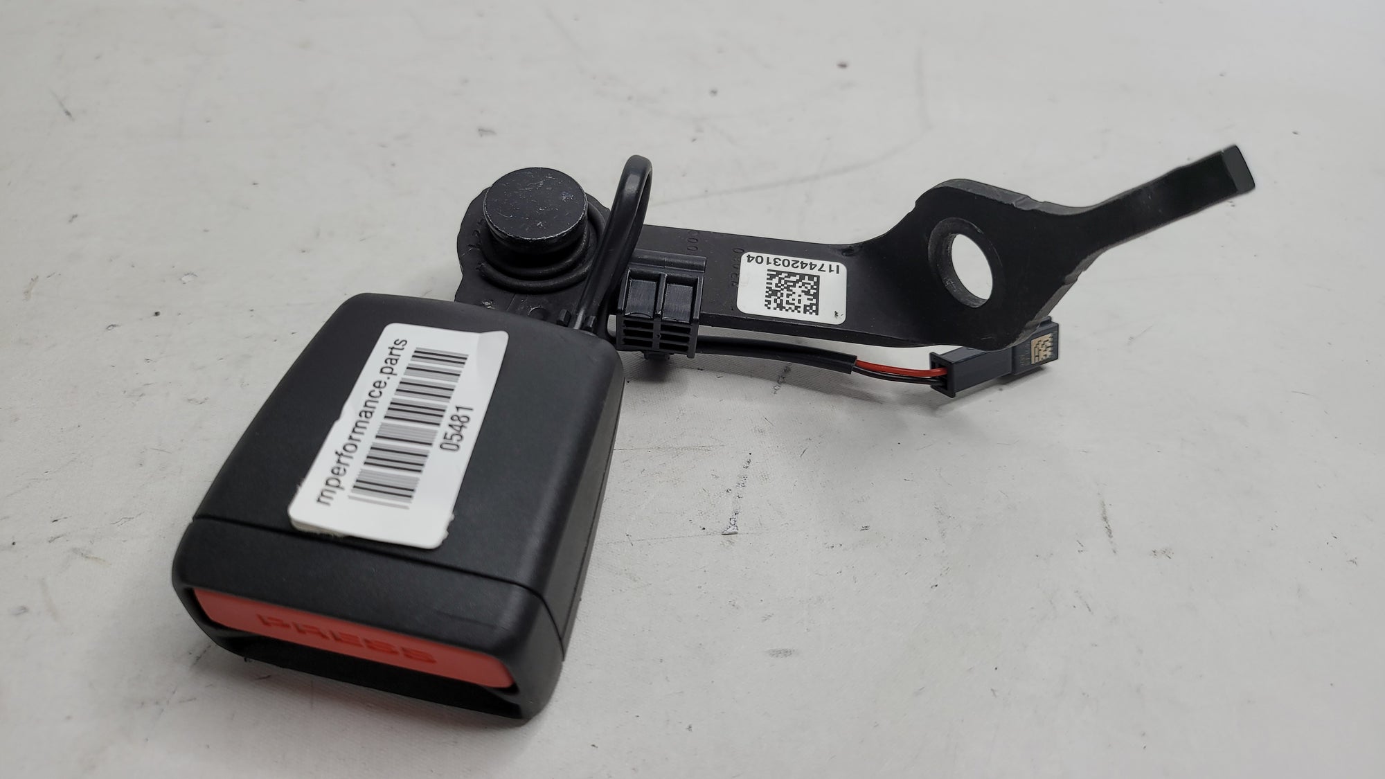 BMW G80 M3 Series tilting lock on the left side, part of MPerformance.parts, showing the metal locking mechanism in detail.