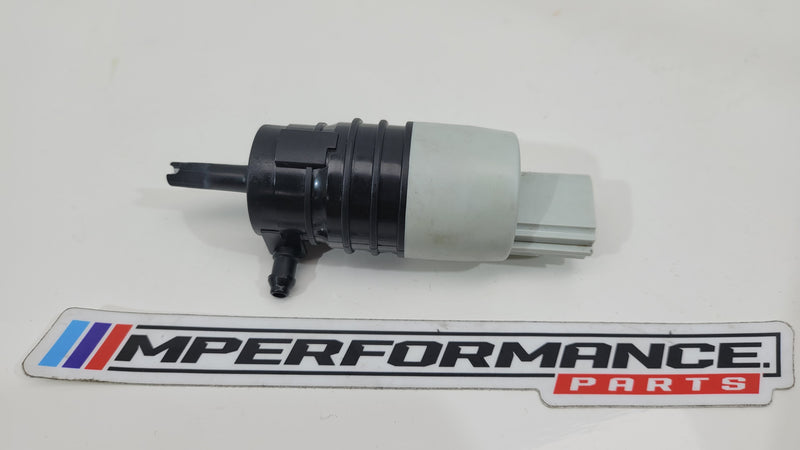 BMW G80 M3 windscreen wash pump by MPerformance.parts, showing the compact pump component for windshield cleaning system.