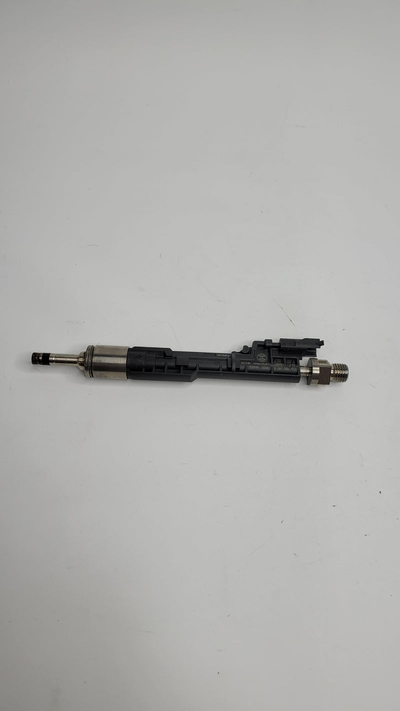 MPerformance.parts F80 M3 injector showing metal body and nozzle for high-performance fuel delivery.