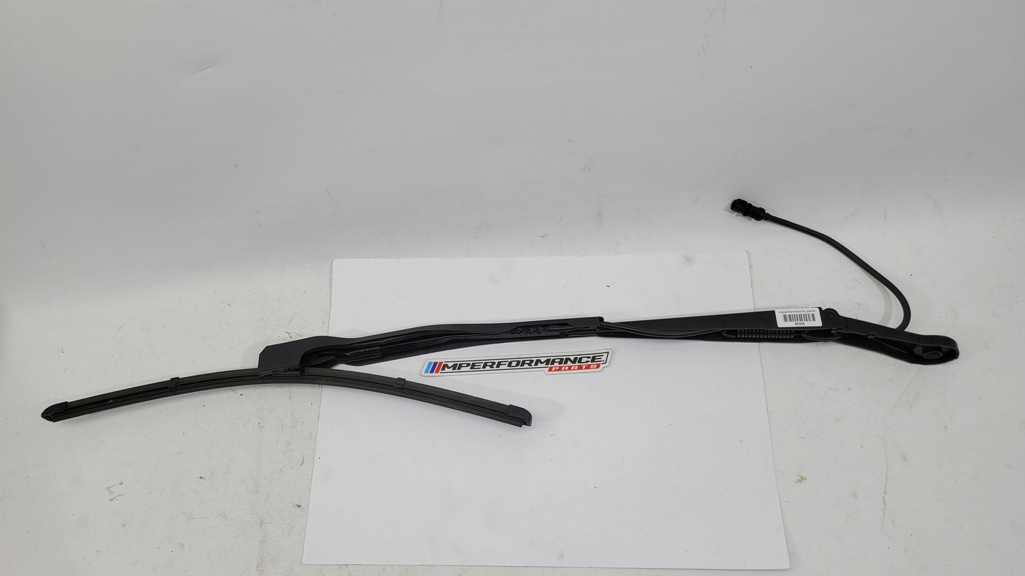 BMW M3 G8x passenger side front wiper arm from MPerformance.parts, showing the black metal wiper arm with mounting details.