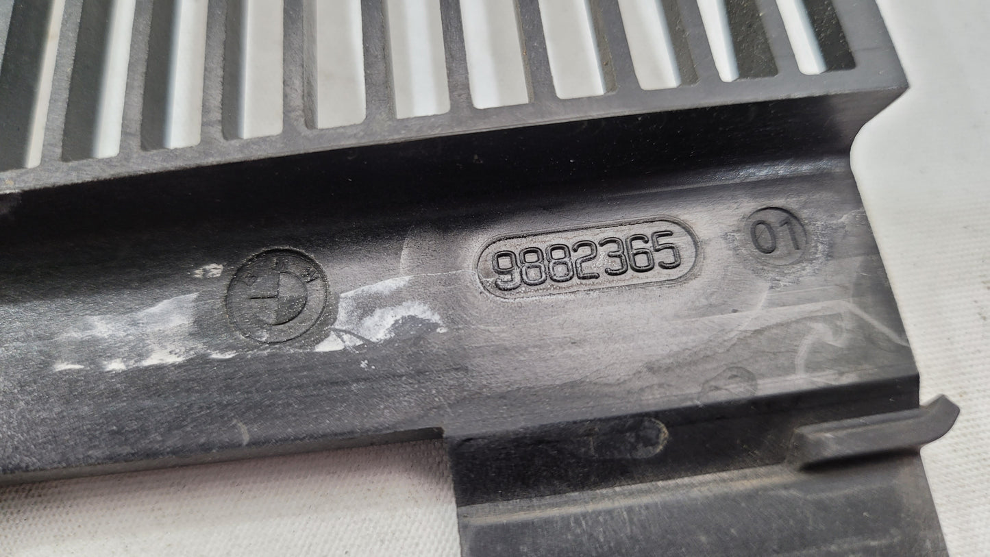 BMW G80 G82 G83 M3 M4 Competition plastic radiator cover shroud by MPerformance.parts, shown installed on the engine bay.