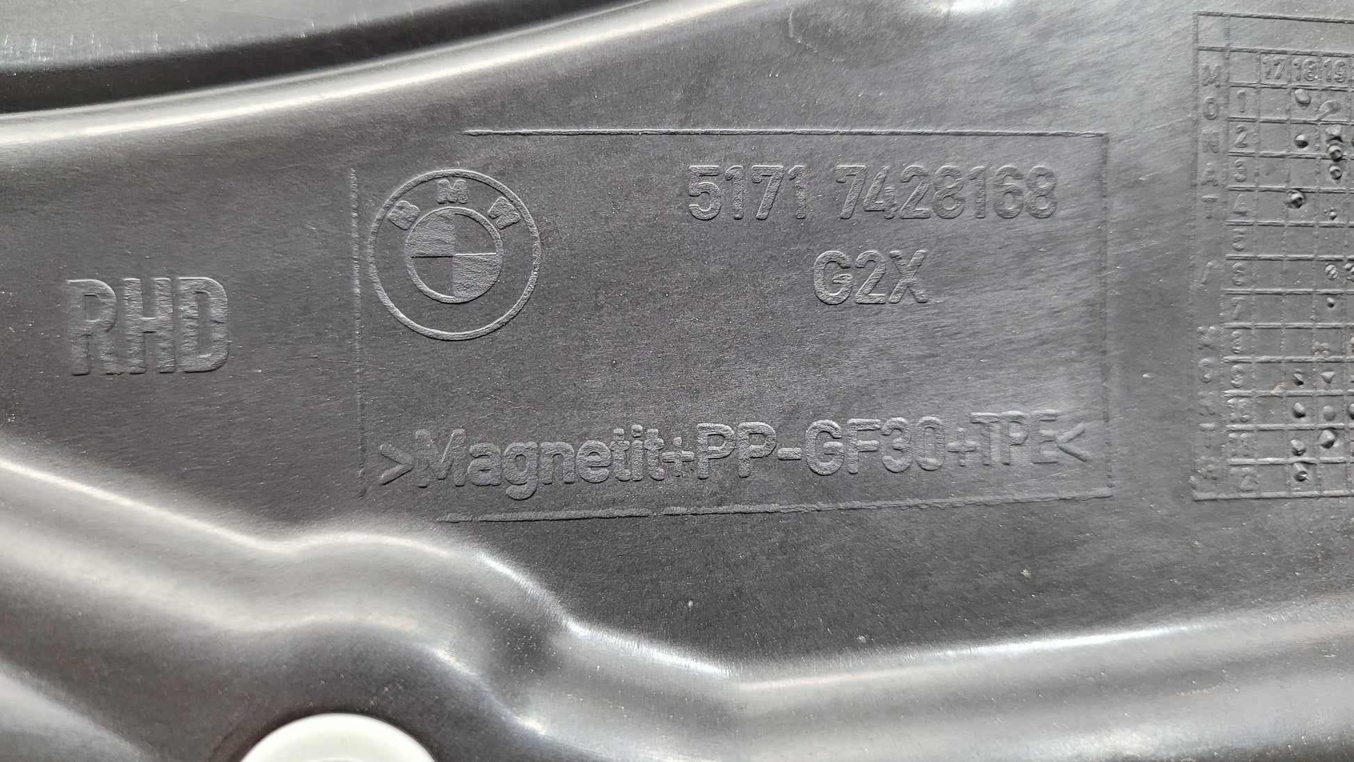 BMW M3 G8X firewall upper section cover panel by MPerformance.parts, showing the black metal engine bay component with mounting points.