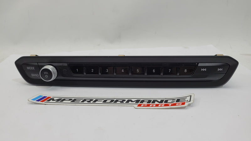 BMW G22 G80 M3 Competition radio control trim by MPerformance.parts, showing the sleek, shiny interior trim piece.