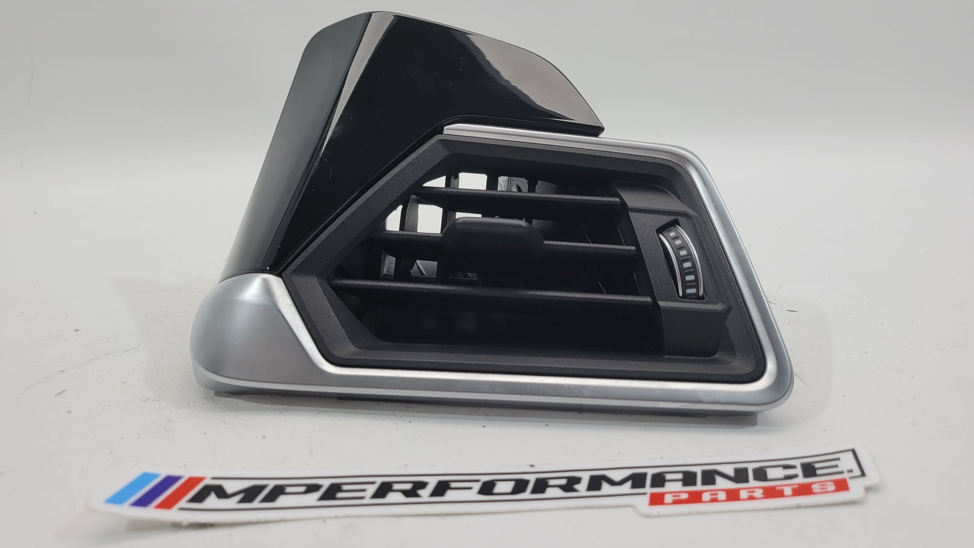 BMW 3 Series G80 right side dashboard air vent grille in black with MPerformance.parts branding, designed for RHD models.