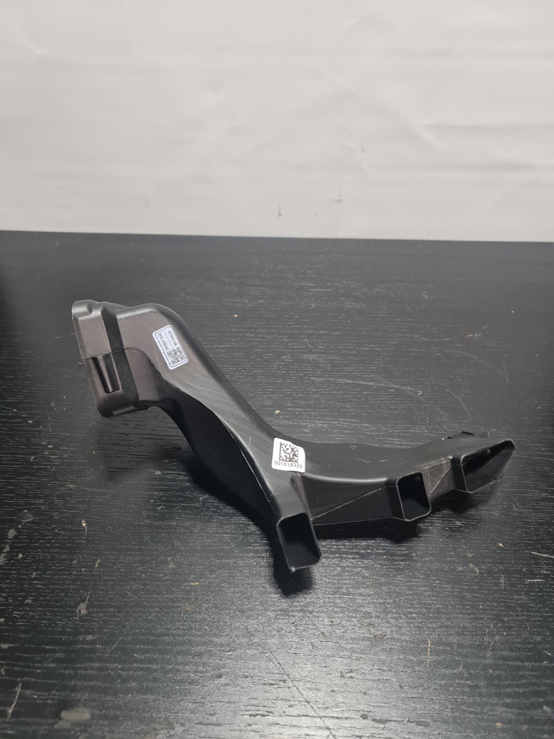 BMW 3 G80 MPerformance.parts air intake tube, black plastic with metal clamps, designed for engine airflow enhancement.