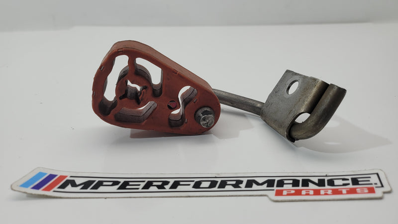 BMW M3 G80 exhaust muffler insulator bracket by MPerformance.parts, showing the metal bracket with mounting points and insulation areas.