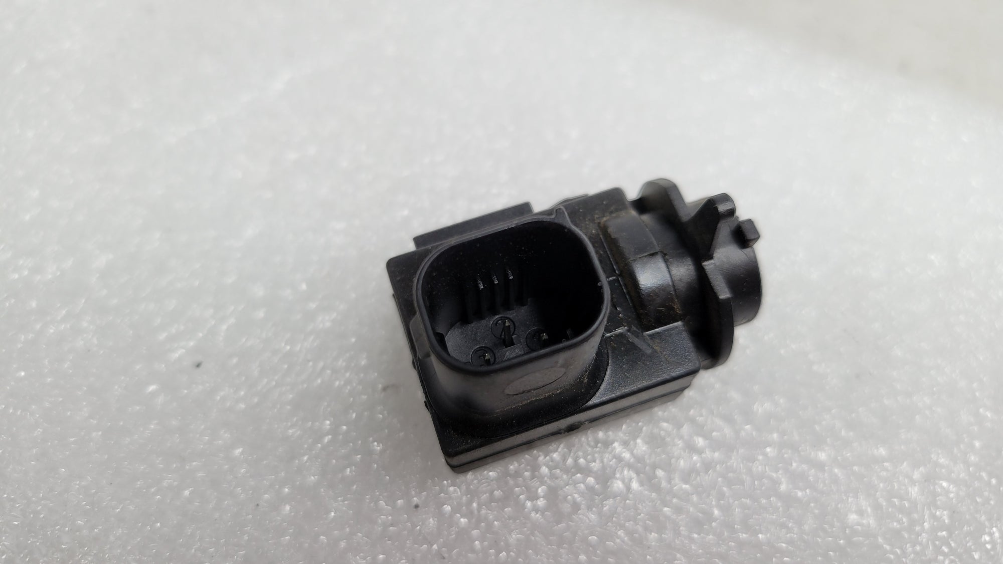 BMW 1 2 3 4 5 Series E60 E66 E87 E90 F20 F30 AUC sensor for air quality by MPerformance.parts, showing the sensor component.