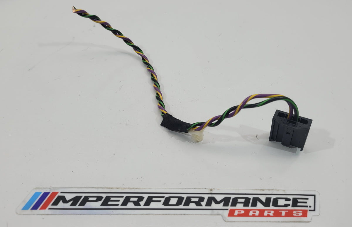 MPerformance.parts flag plug, small black car accessory with logo, designed for automotive use and easy installation.