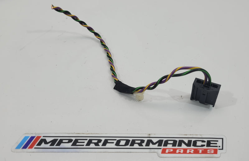 MPerformance.parts flag plug, small black car accessory with logo, designed for automotive use and easy installation.