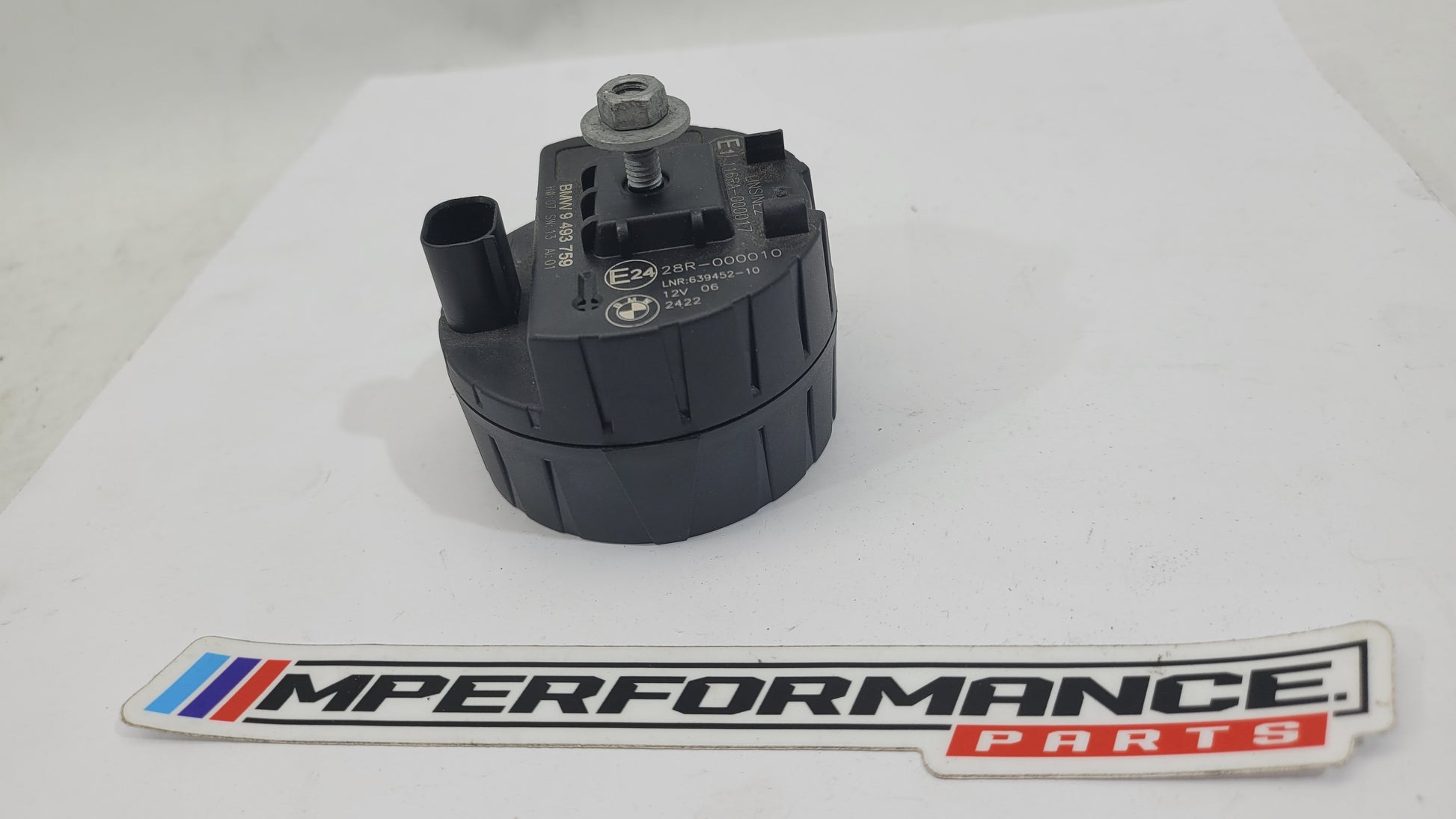 BMW M2 F87 sensor alarm horn siren control module unit 9493759, compact automotive electronic component with wiring and connectors visible.